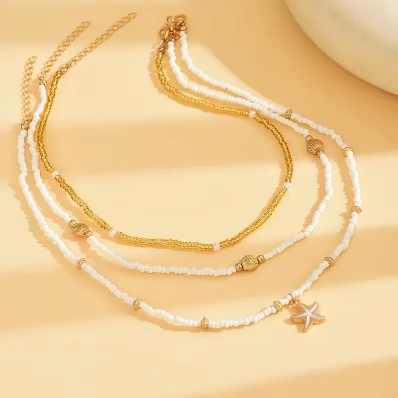 Collana con conchiglia e stella - Delicata ed estiva