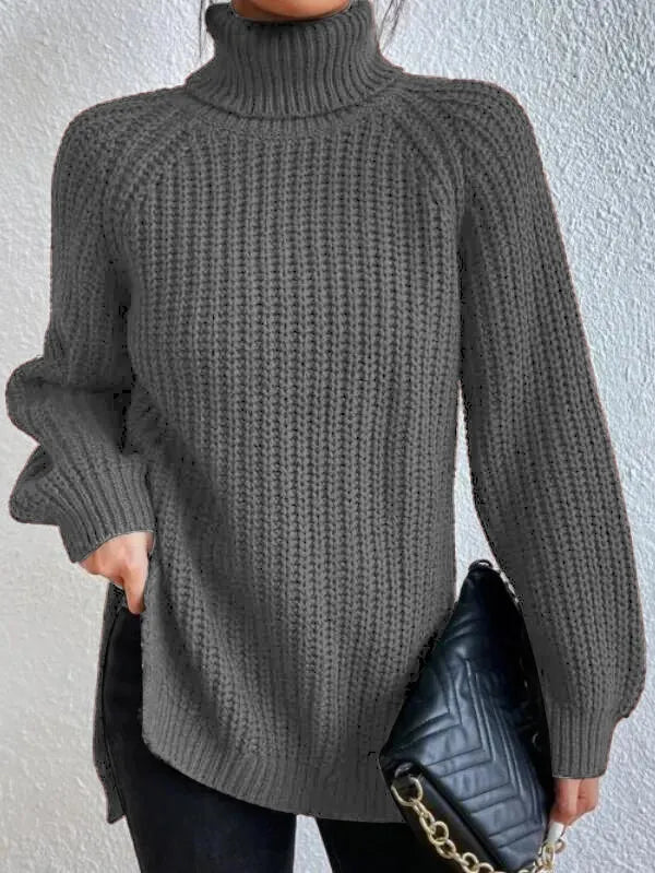 Maglione dolcevita da donna con maniche raglan e orlo spaccato