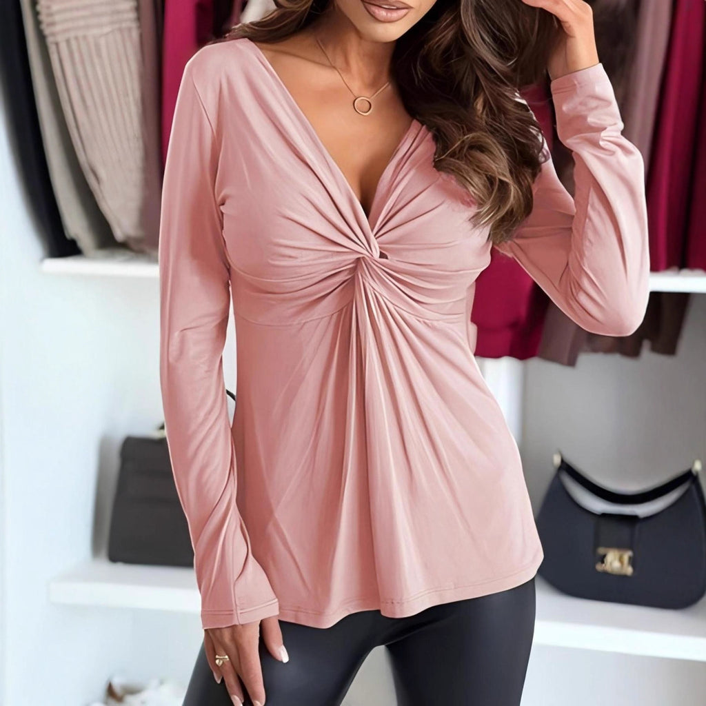 Solid-color women's top with long sleeves, a V-neck, and pleats – Fluid and elegant