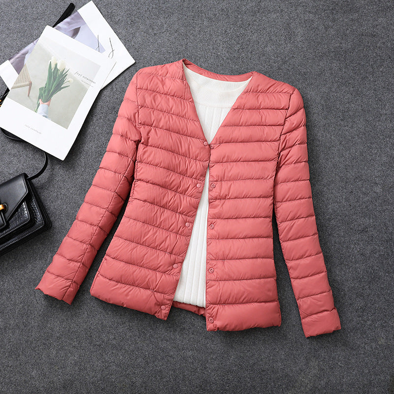 Giacca isolante leggera da donna – Indumento interno corto con scollo rotondo