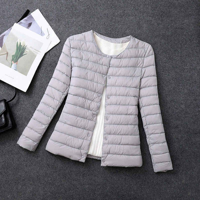 Giacca isolante leggera da donna – Indumento interno corto con scollo rotondo