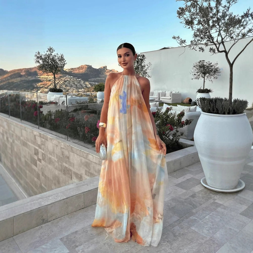 Abito maxi stampato da donna con collo halter e schiena scoperta