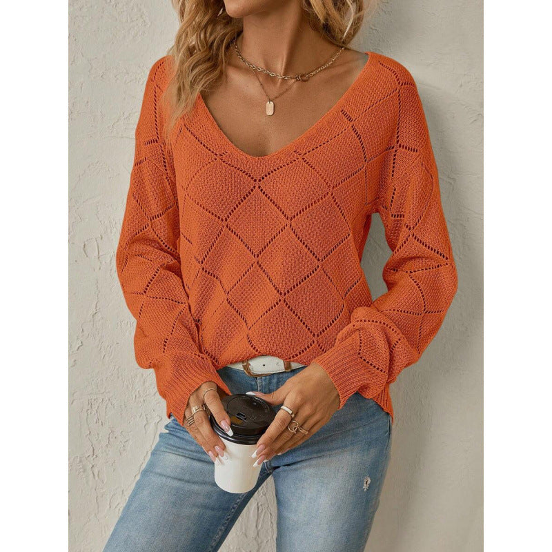 Ensfarvet sweater med pufærmer - Blød og feminin