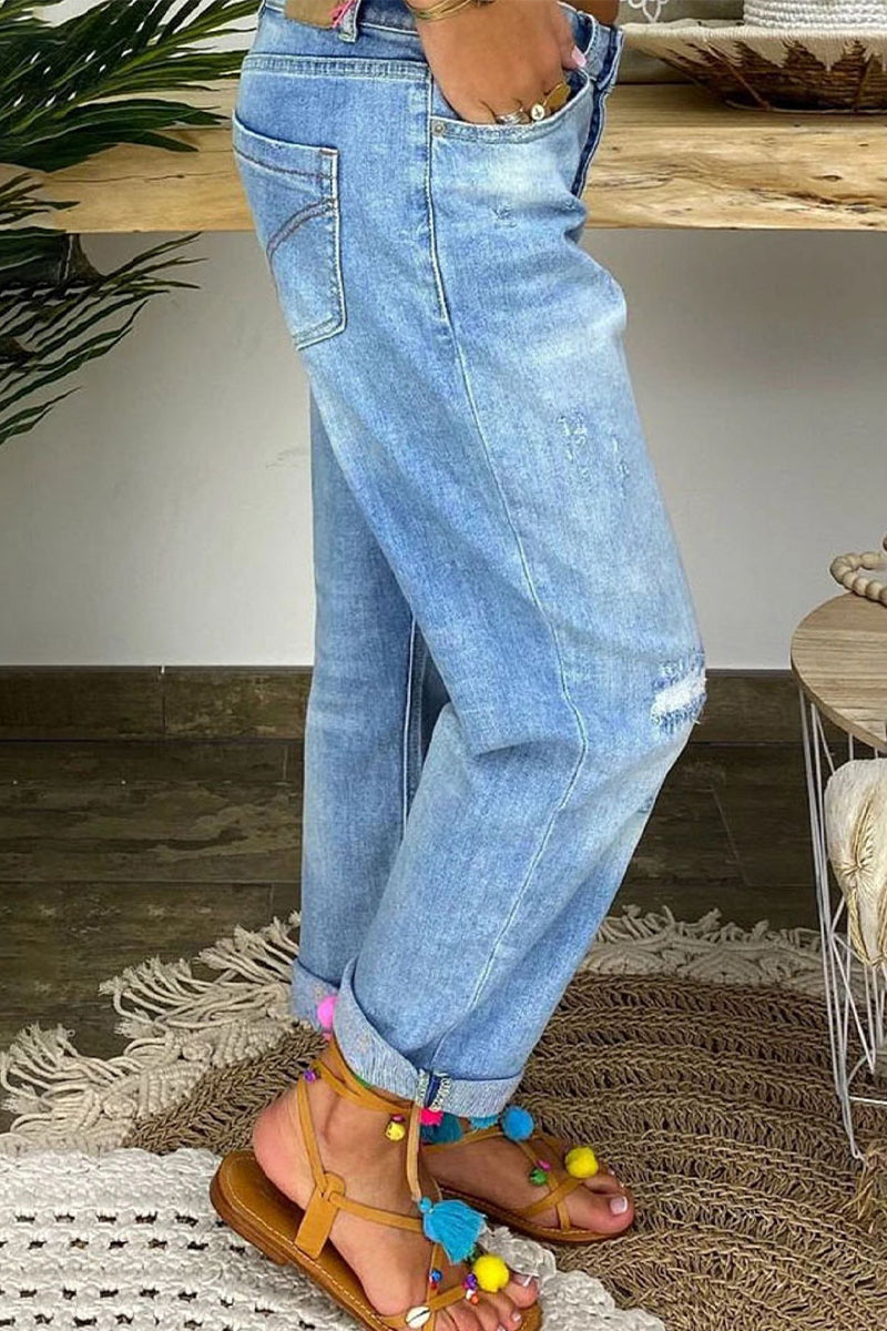 Donna Jeans strappati a vita bassa
