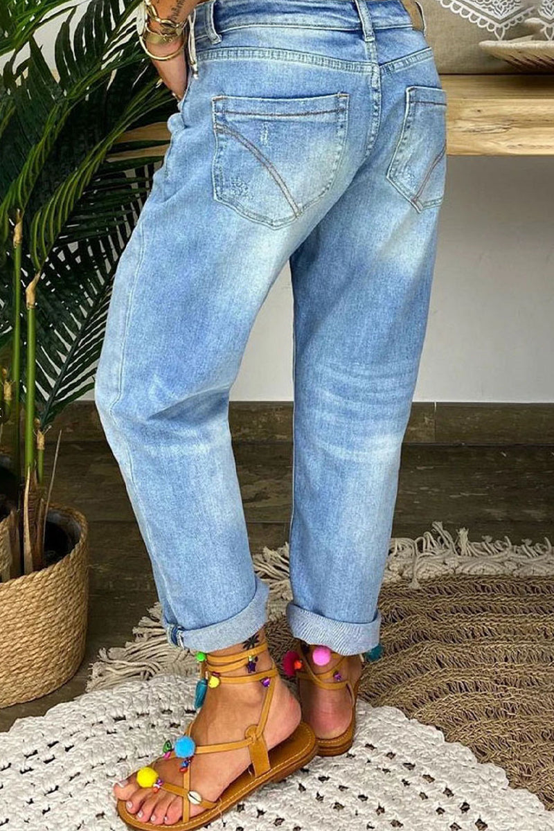 Donna Jeans strappati a vita bassa