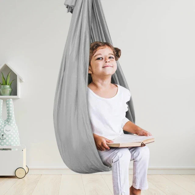 Therapeutic swing for children: relaxing and playful