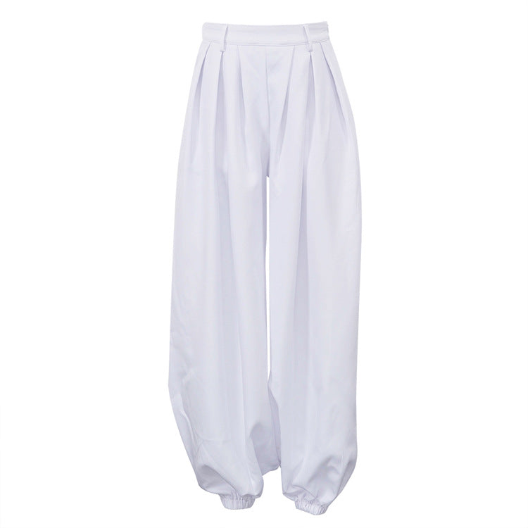 Pantaloni donna bianchi a vita alta dal taglio ampio