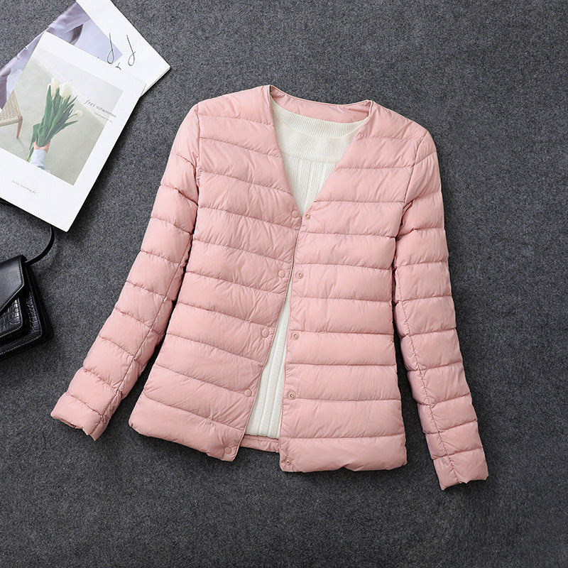Giacca isolante leggera da donna – Indumento interno corto con scollo rotondo