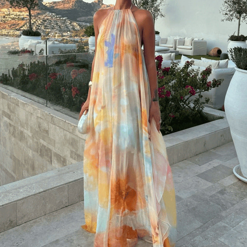 Abito maxi stampato da donna con collo halter e schiena scoperta