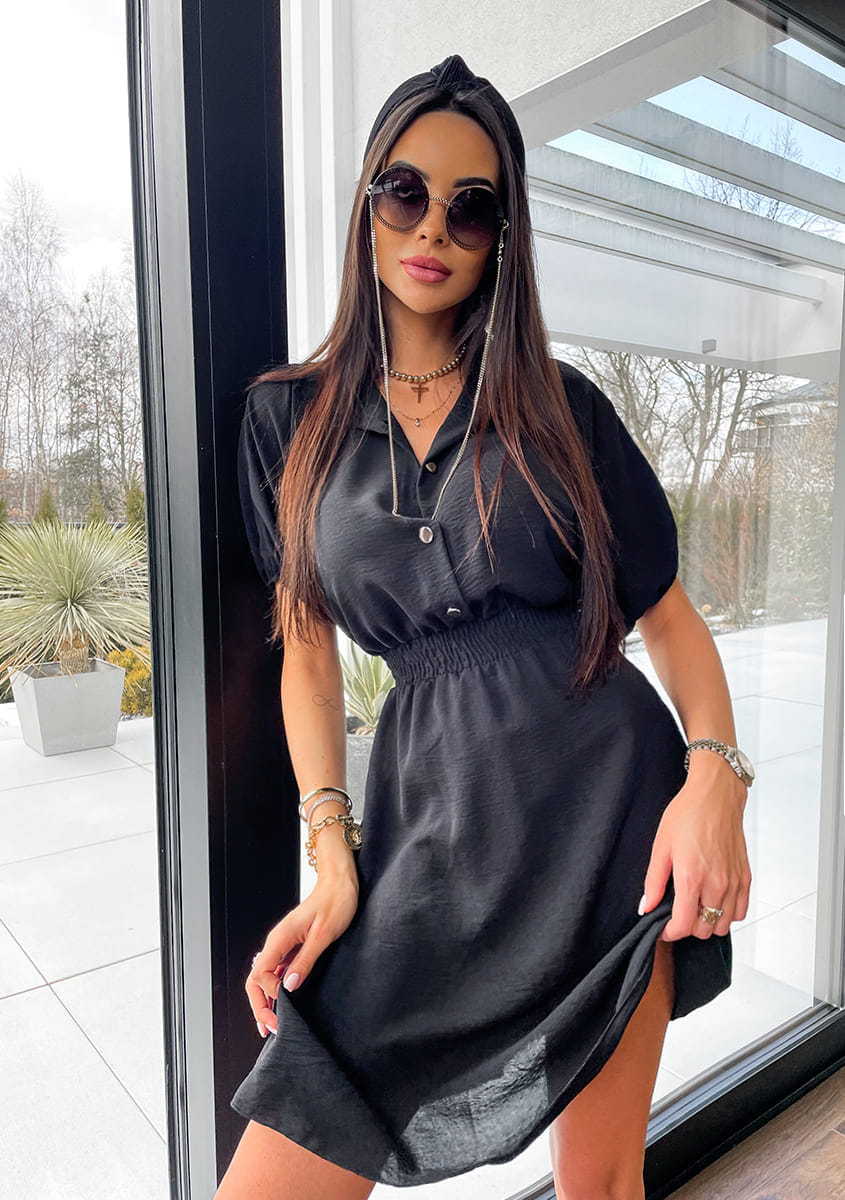 Abito donna con colletto sartoriale e vita definita