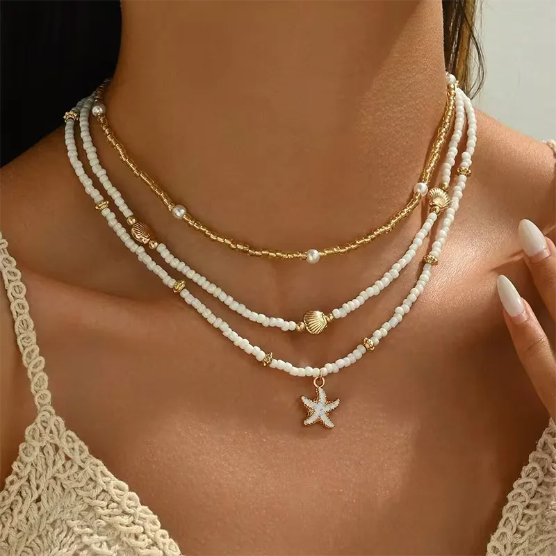 Collana con conchiglia e stella - Delicata ed estiva