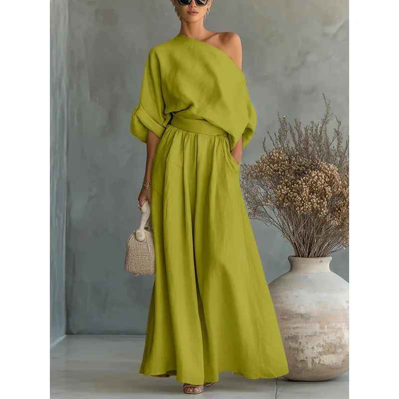 Completo donna con top spalle scoperte e pantaloni affusolati – Leggero e chic