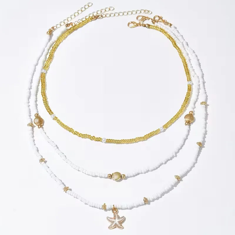 Collana con conchiglia e stella - Delicata ed estiva