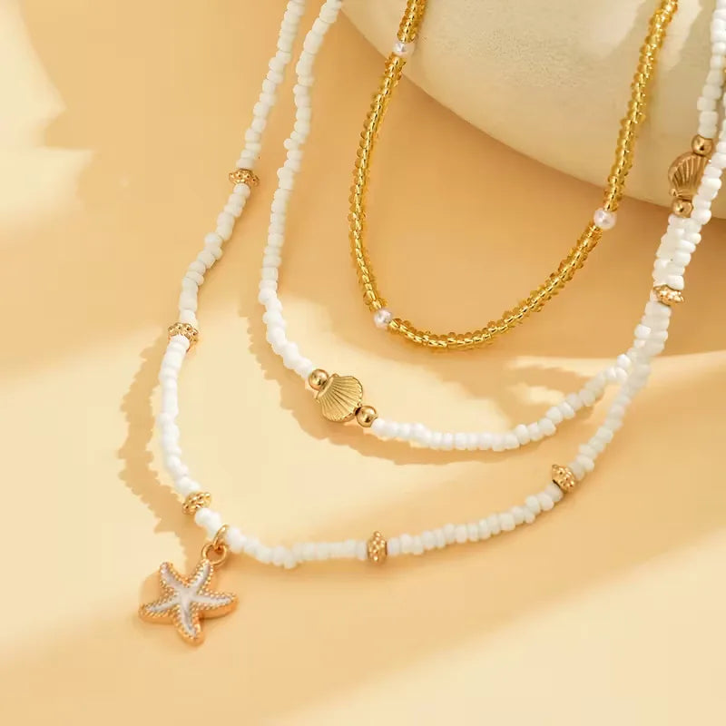 Collana con conchiglia e stella - Delicata ed estiva