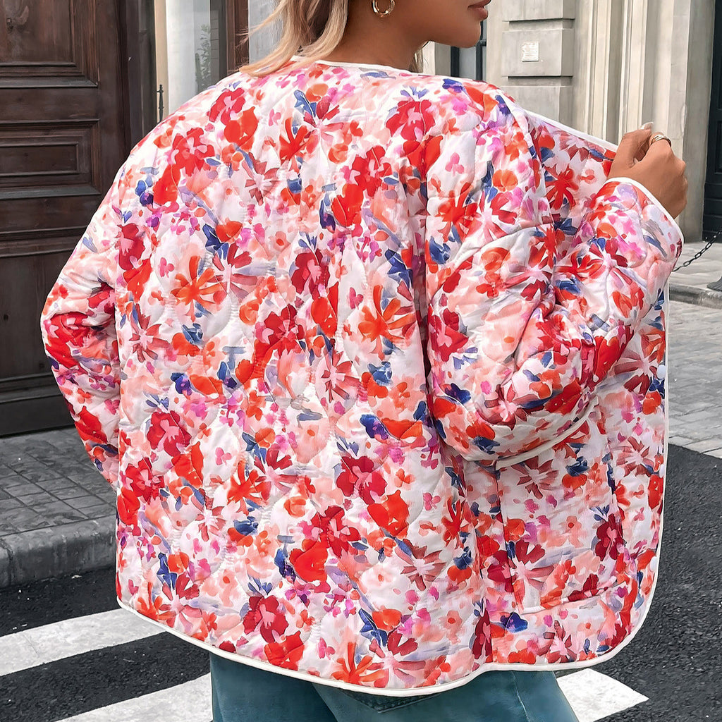 Blusa donna stampata con bottoni e tasche dal taglio morbido