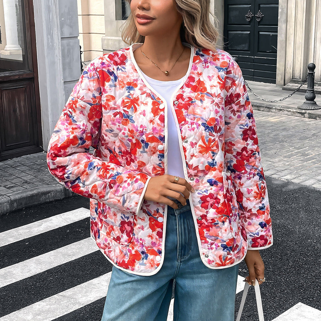 Blusa donna stampata con bottoni e tasche dal taglio morbido