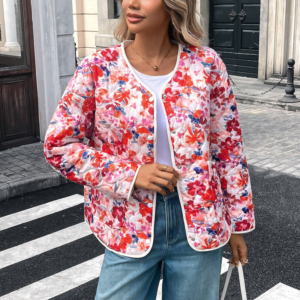 Blusa donna stampata con bottoni e tasche dal taglio morbido