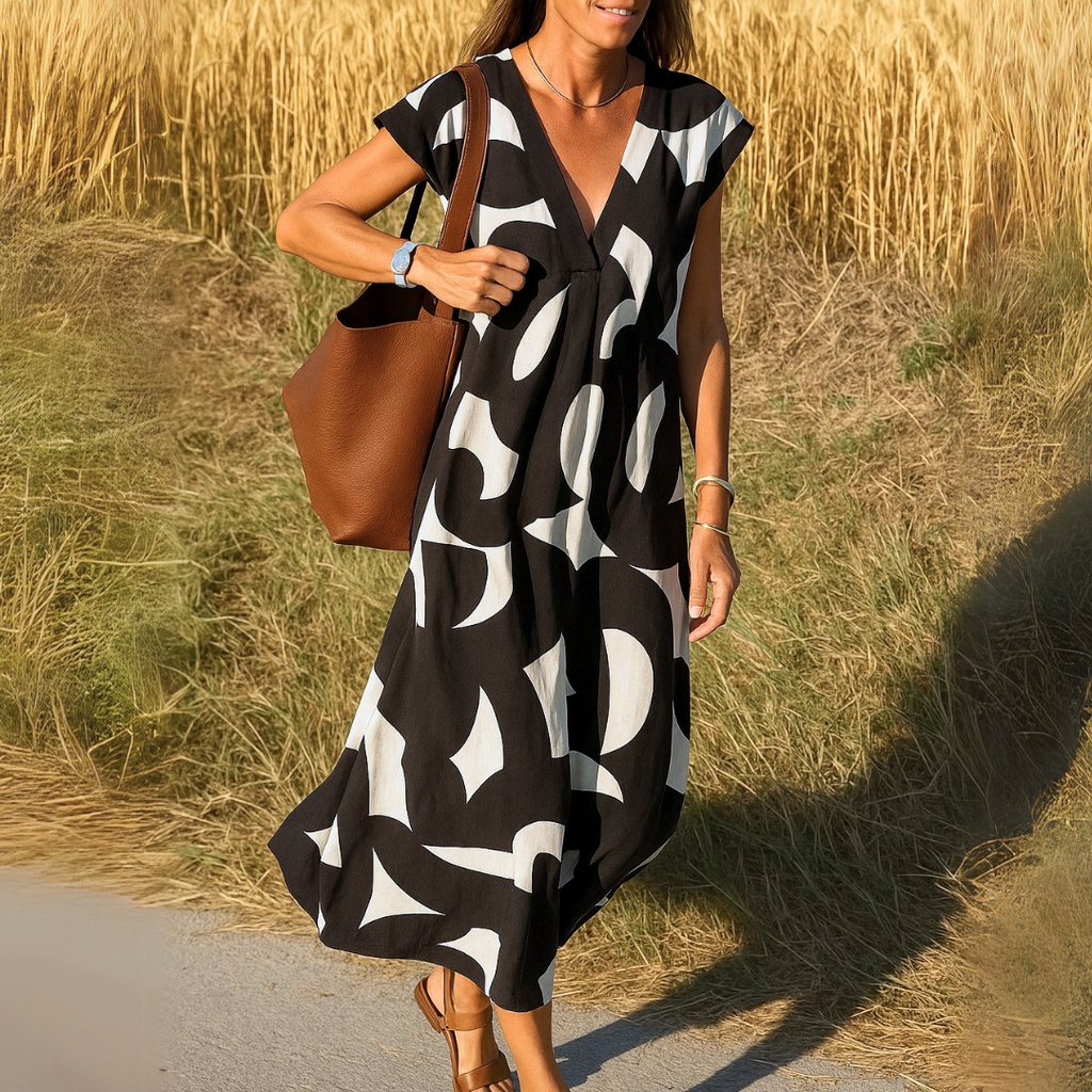 Abito midi Shaira con stampa geometrica bianco nero e scollo a V