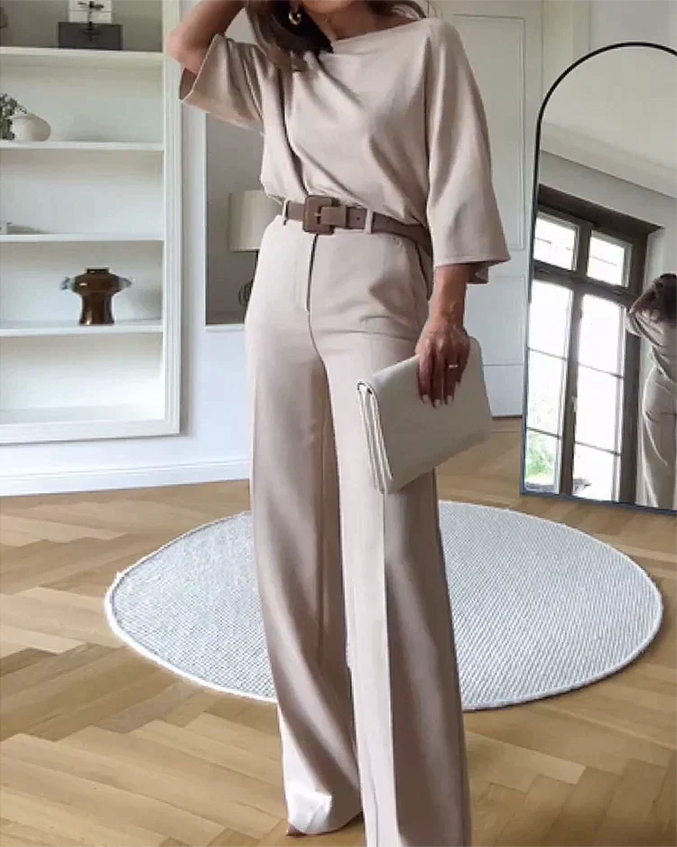 Elegante completo da donna in due pezzi - top con maniche a pipistrello e pantaloni a gamba larga