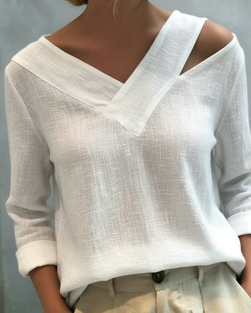 Top elegante da donna con scollo a V asimmetrico, perfetto per il lavoro e le feste