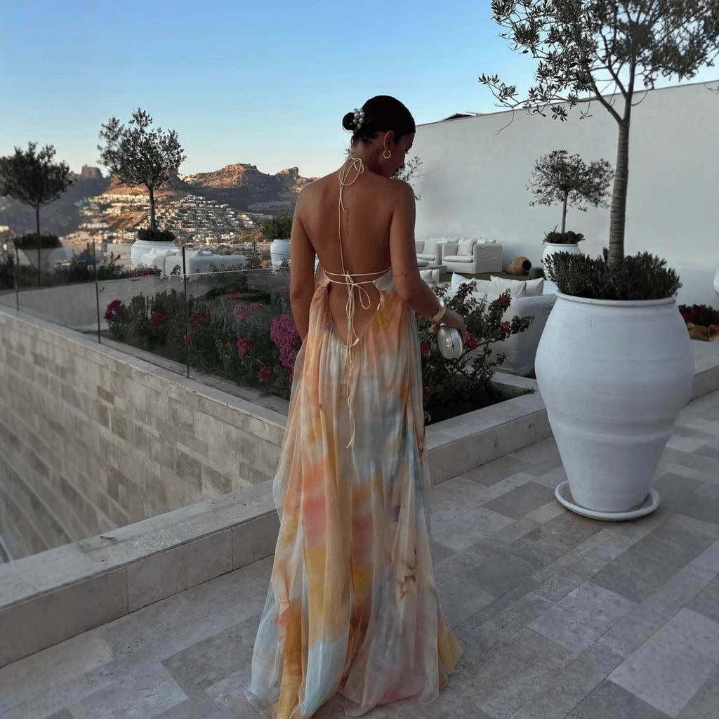 Abito maxi stampato da donna con collo halter e schiena scoperta