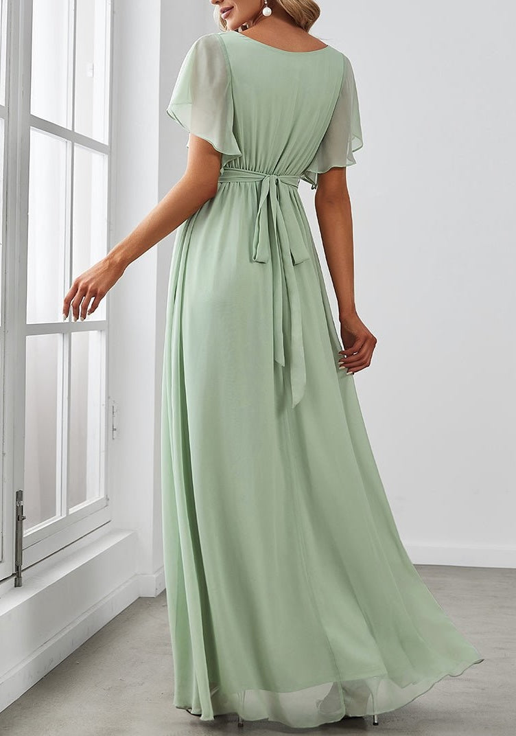 Abito da cerimonia verde a trapezio per invitata a un matrimonio – Elegante e formale