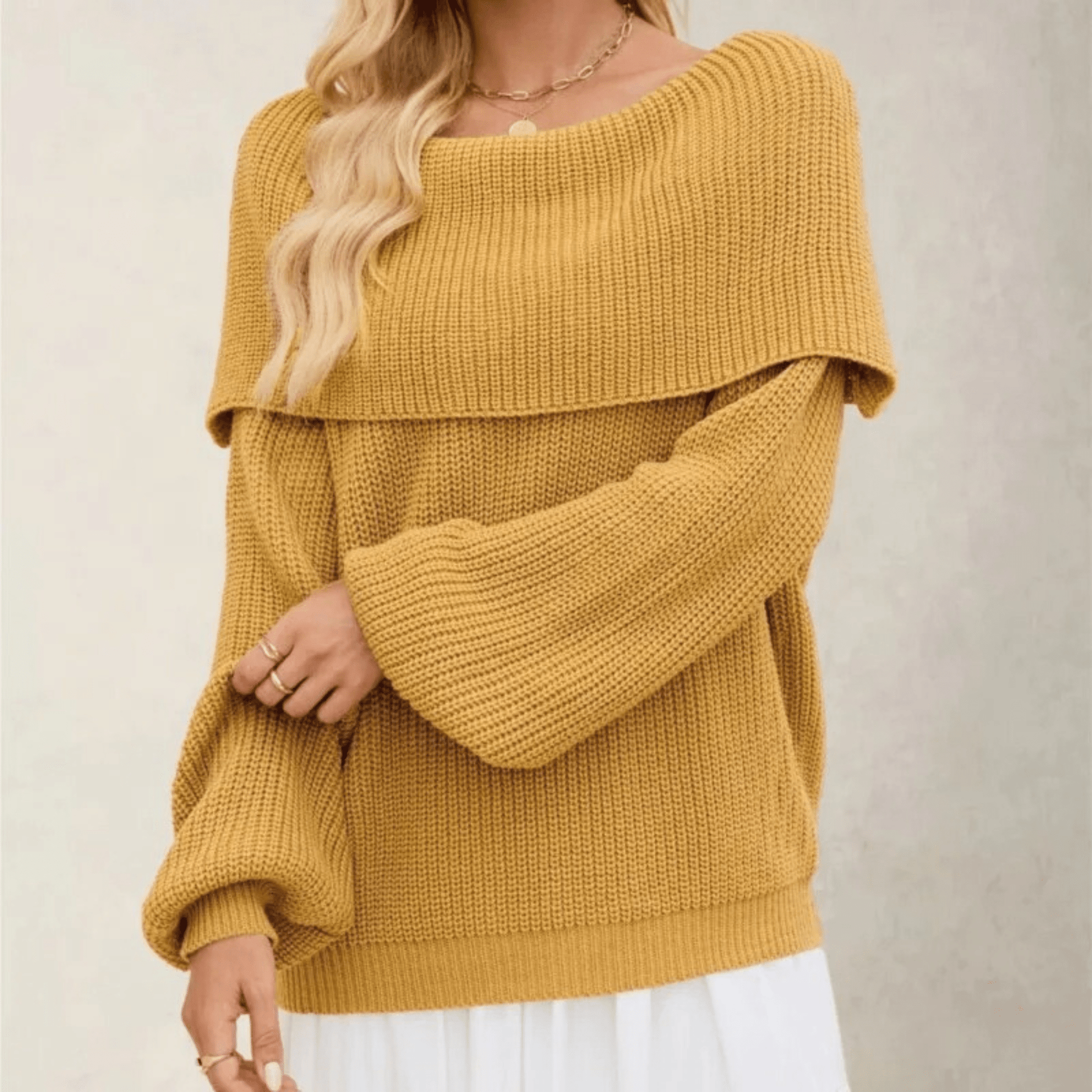 Pull femme en maille à épaules dénudées – Style doux, chic et élégant.