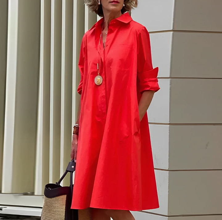 Elegante abito polo con vestibilità elasticizzata e materiale traspirante