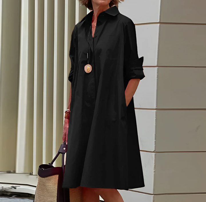 Elegante abito polo con vestibilità elasticizzata e materiale traspirante