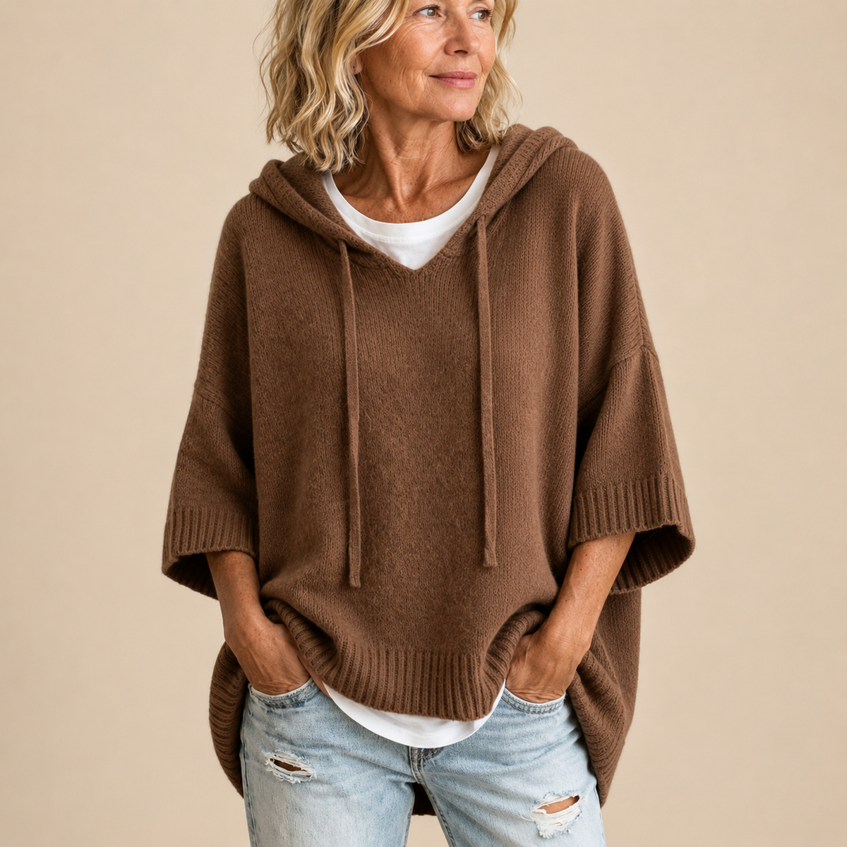 Poncho donna in maglia con cappuccio - Morbido e pratico
