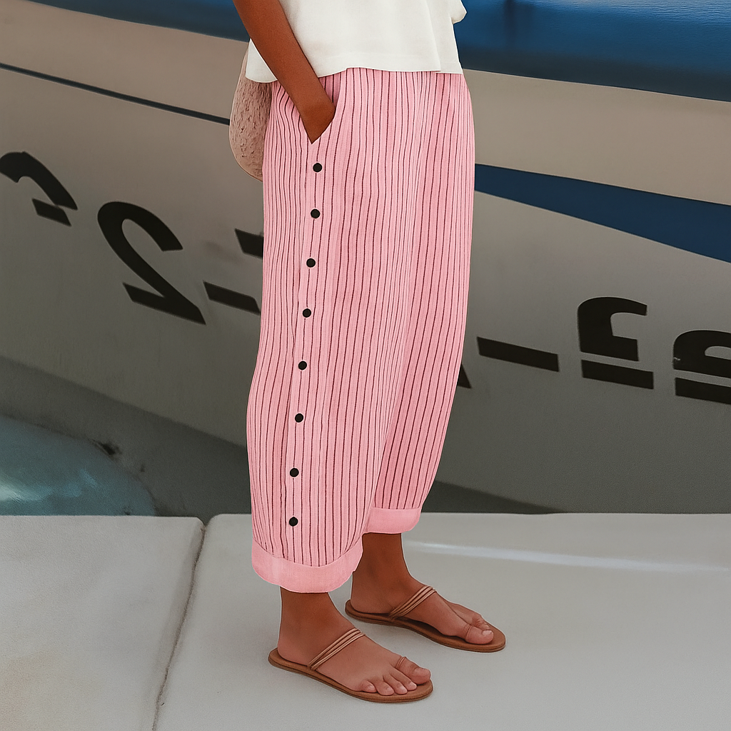 Pantaloni donna a righe con bottoni a contrasto - Chic e fluidi