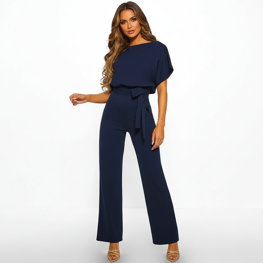 Elegante tuta da donna con cintura in - vita e vestibilità fluida.