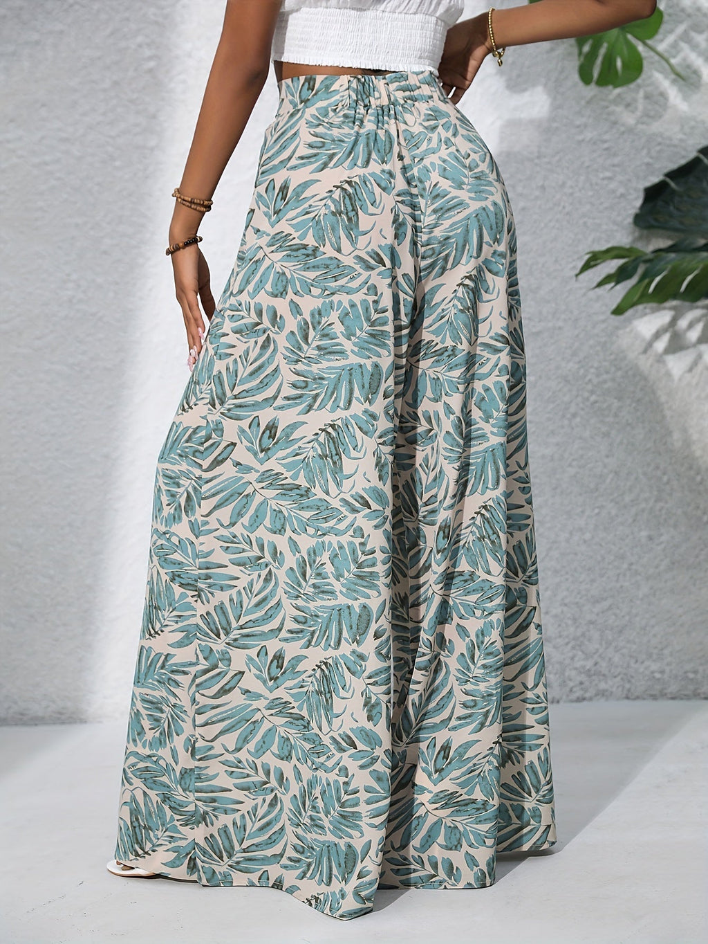 Pantaloni palazzo da donna a vita alta con stampa floreale - Fluidi ed eleganti
