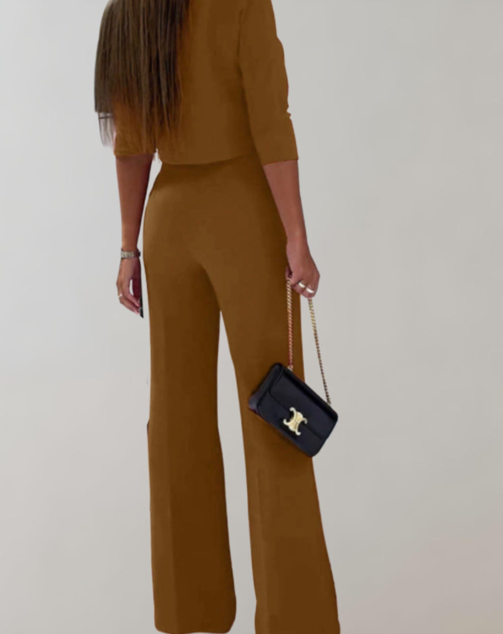 Completo da donna con pantaloni a gamba larga e top a maniche 3/4 - Due pezzi