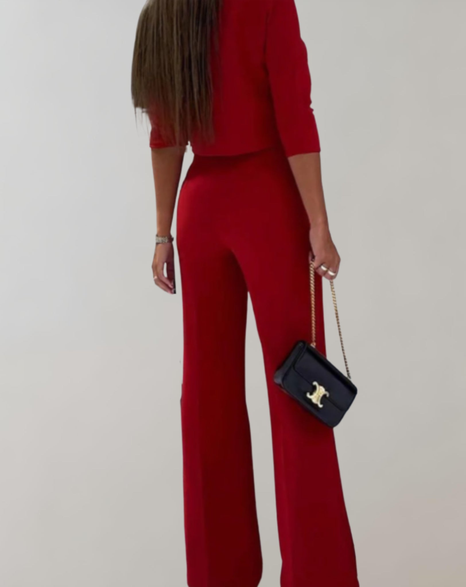 Completo da donna con pantaloni a gamba larga e top a maniche 3/4 - Due pezzi