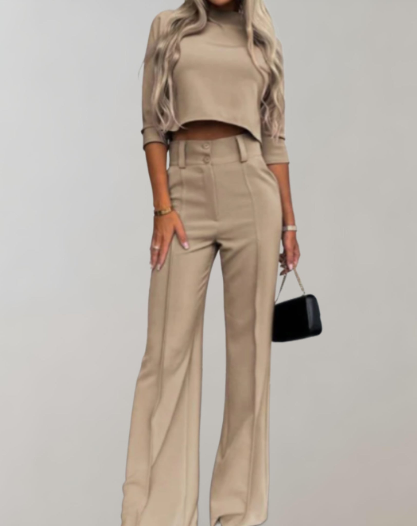 Completo da donna con pantaloni a gamba larga e top a maniche 3/4 - Due pezzi