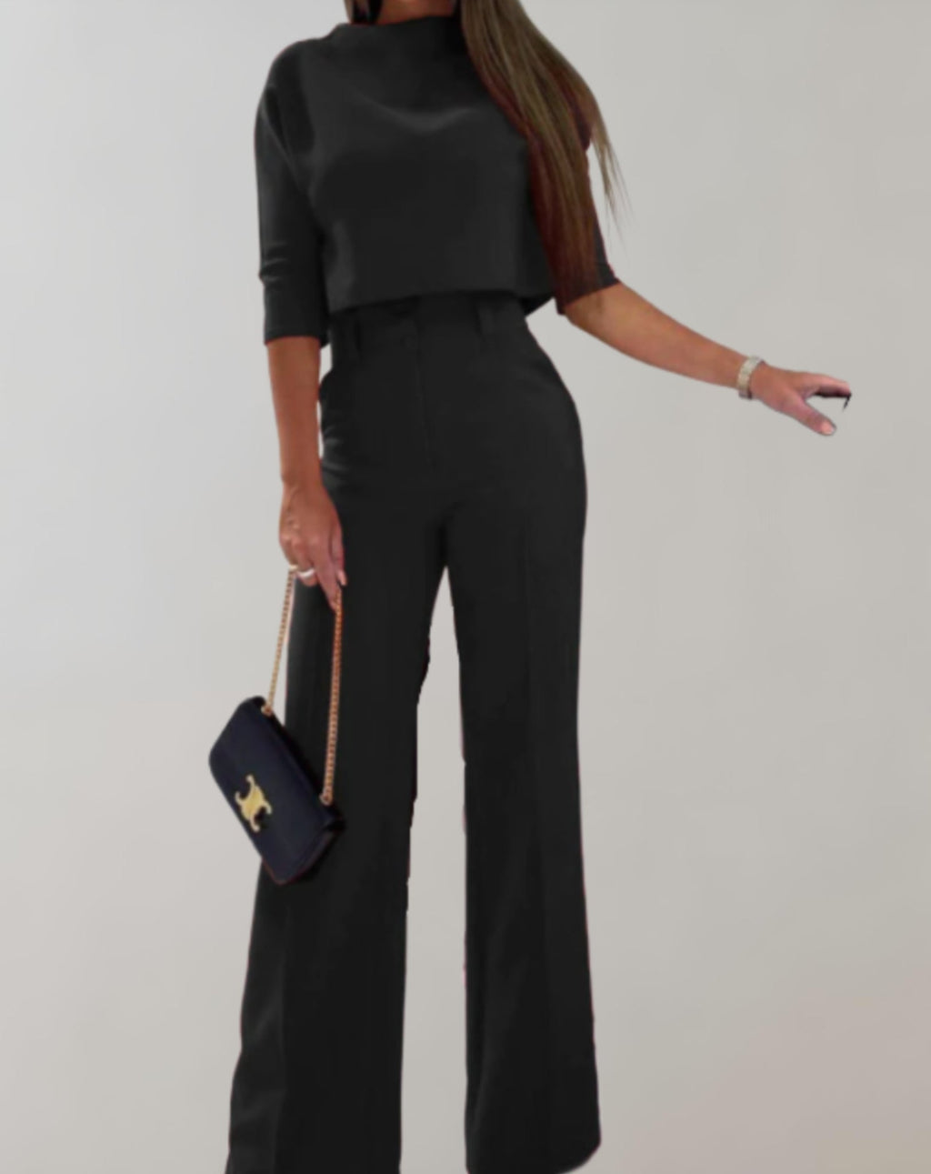 Completo da donna con pantaloni a gamba larga e top a maniche 3/4 - Due pezzi