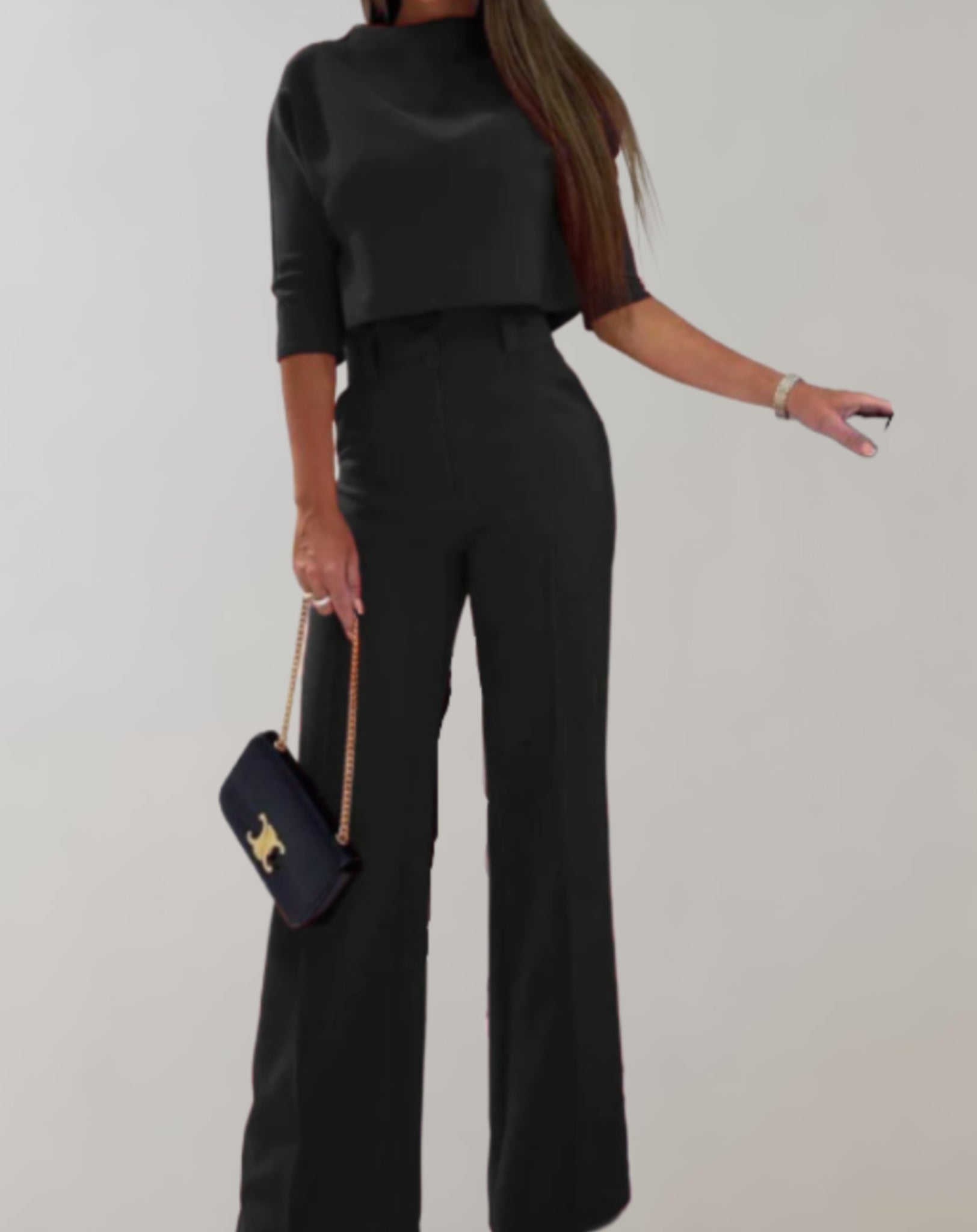 Completo da donna con pantaloni a gamba larga e top a maniche 3/4 - Due pezzi