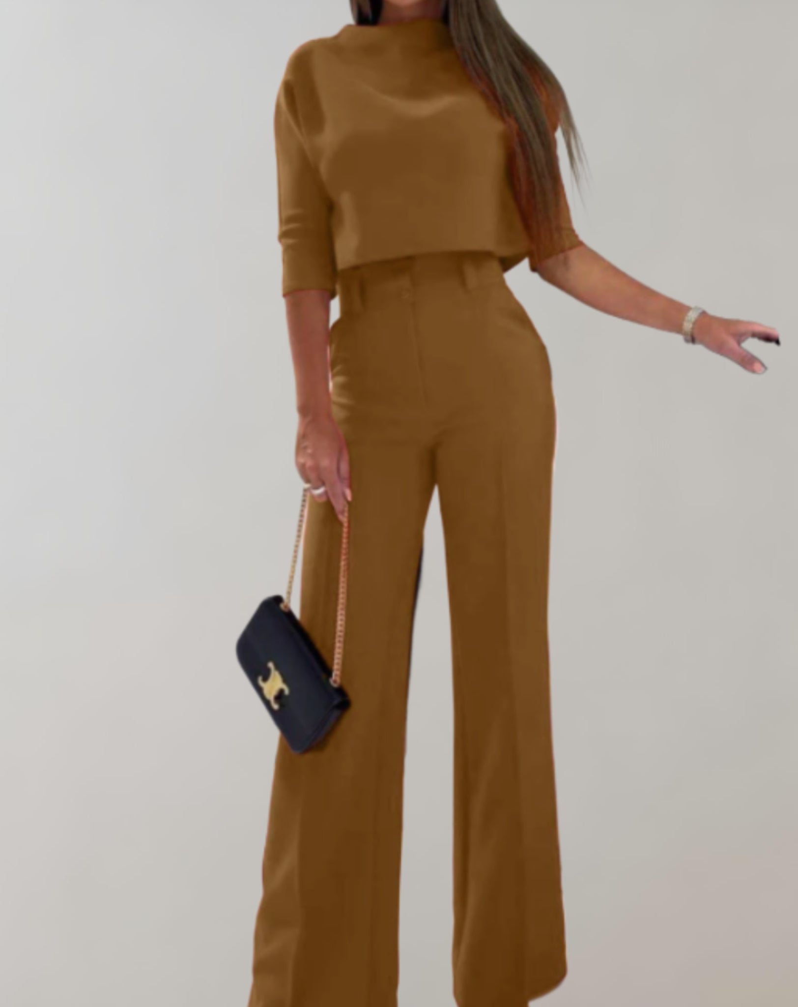 Completo da donna con pantaloni a gamba larga e top a maniche 3/4 - Due pezzi
