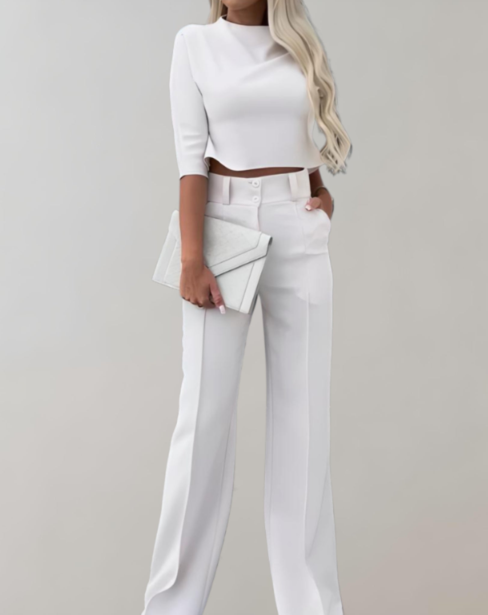 Completo da donna con pantaloni a gamba larga e top a maniche 3/4 - Due pezzi