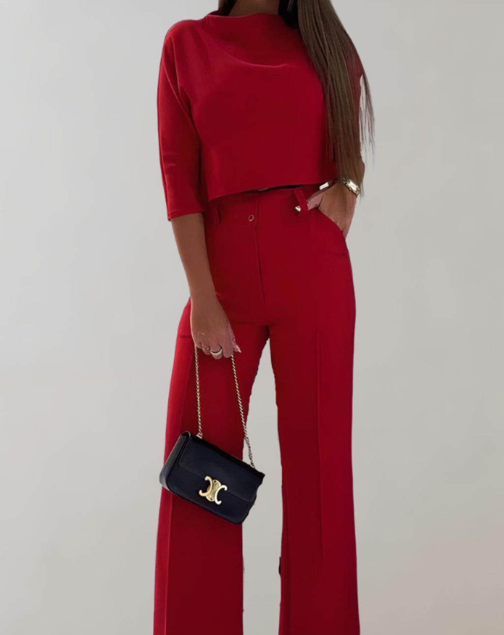 Completo da donna con pantaloni a gamba larga e top a maniche 3/4 - Due pezzi