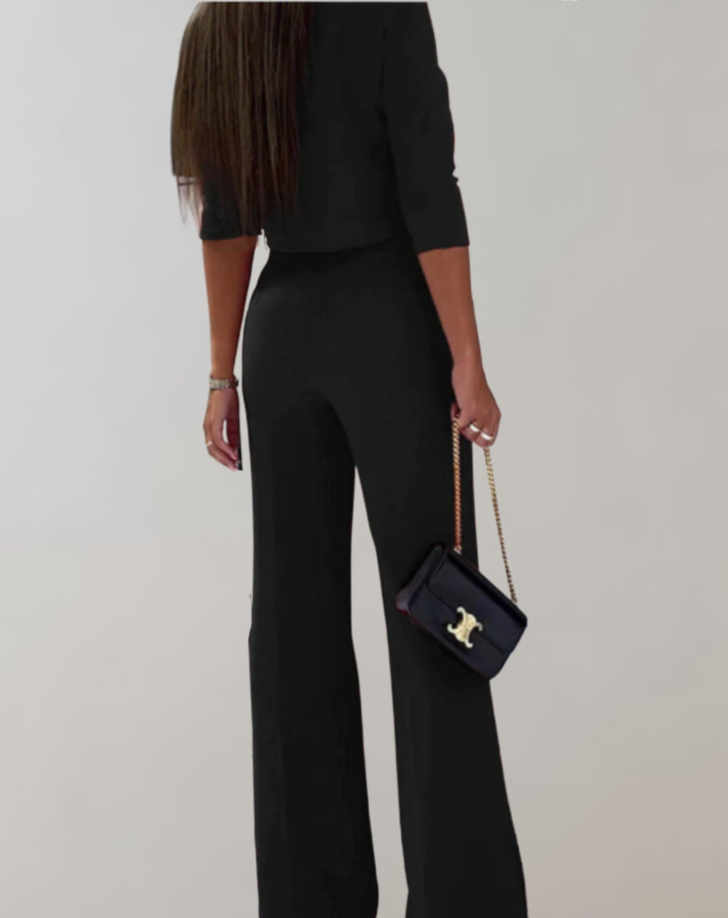 Completo da donna con pantaloni a gamba larga e top a maniche 3/4 - Due pezzi