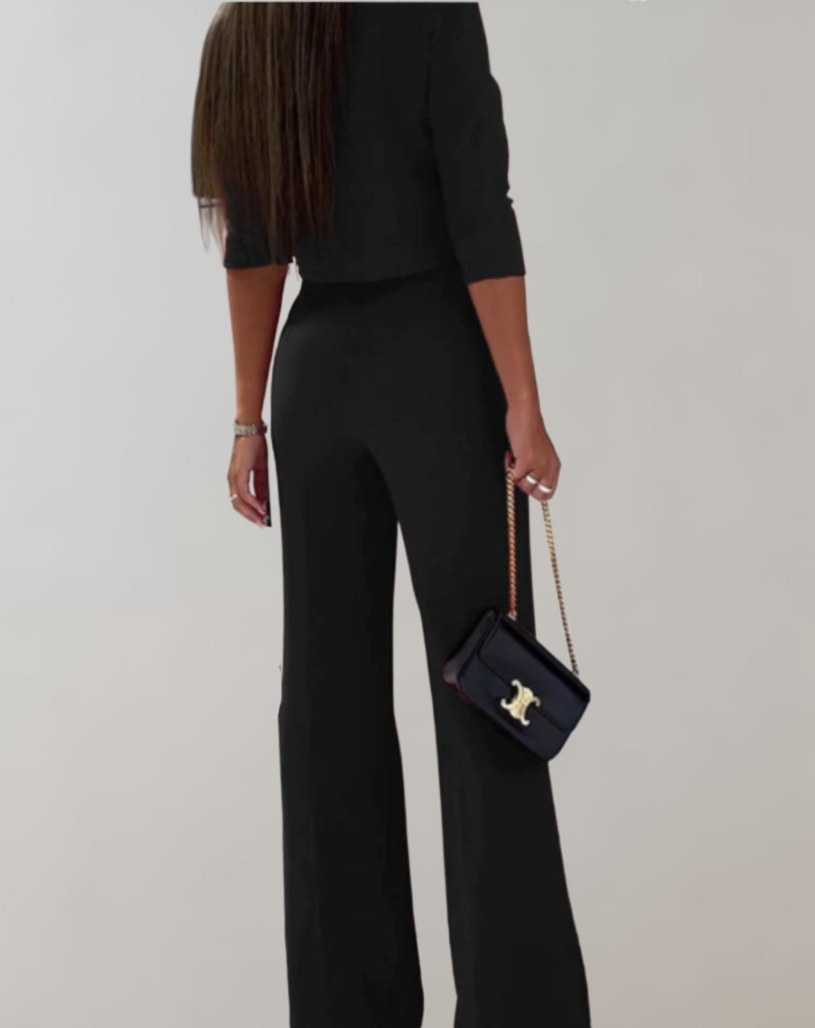 Completo da donna con pantaloni a gamba larga e top a maniche 3/4 - Due pezzi