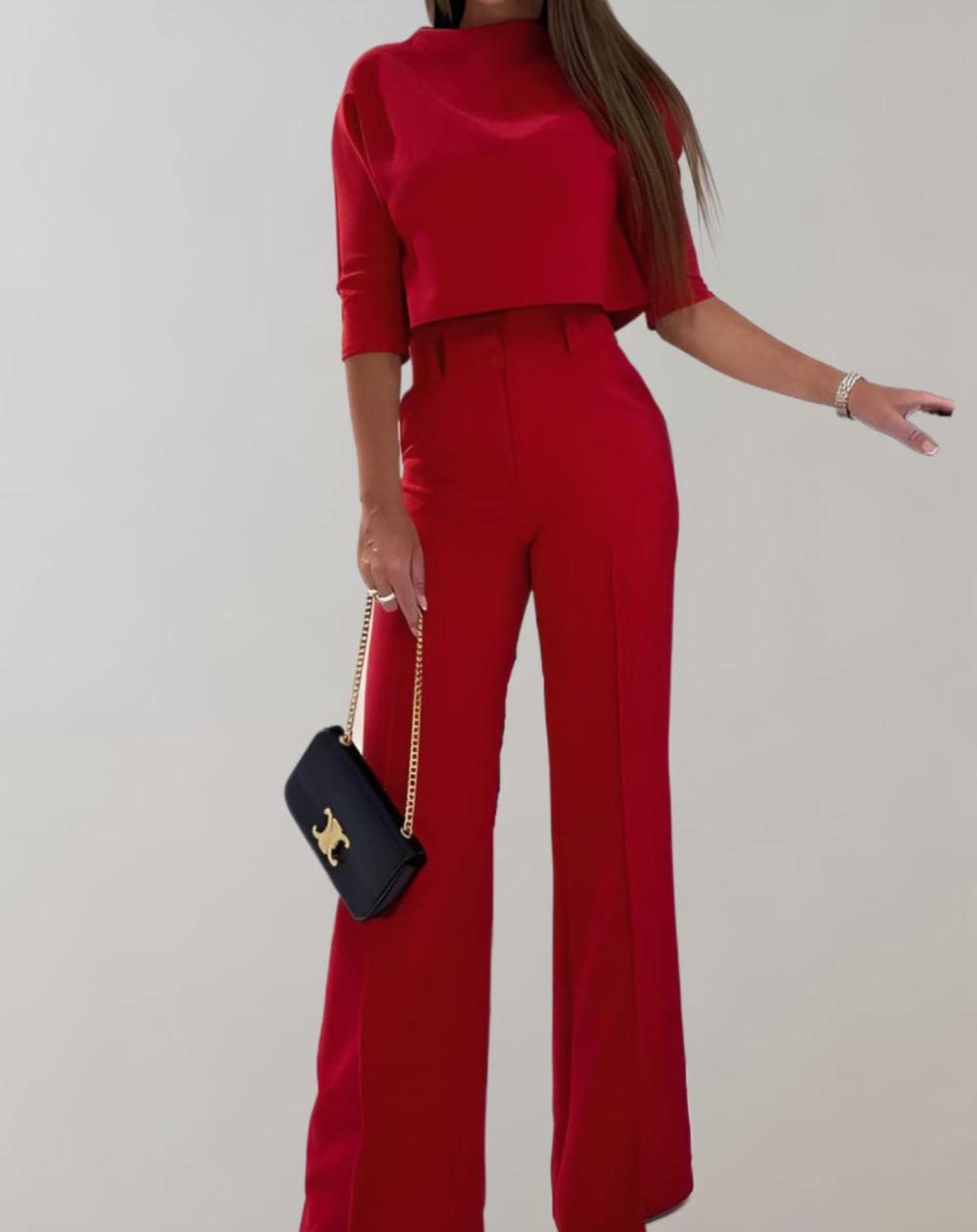 Completo da donna con pantaloni a gamba larga e top a maniche 3/4 - Due pezzi