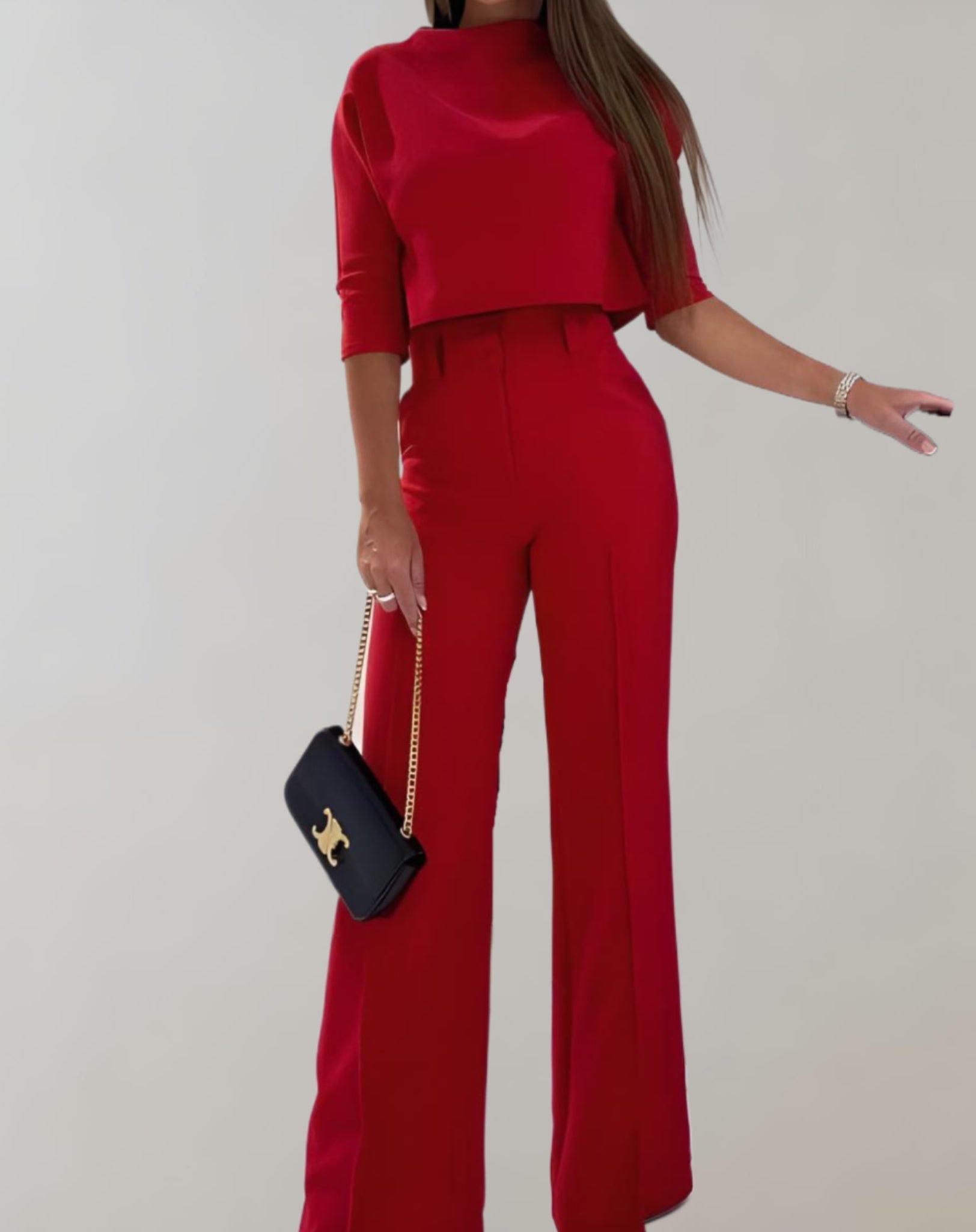 Completo da donna con pantaloni a gamba larga e top a maniche 3/4 - Due pezzi
