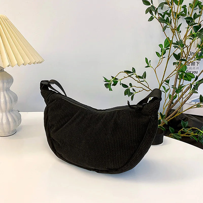 Elegante borsa a tracolla in velluto a coste