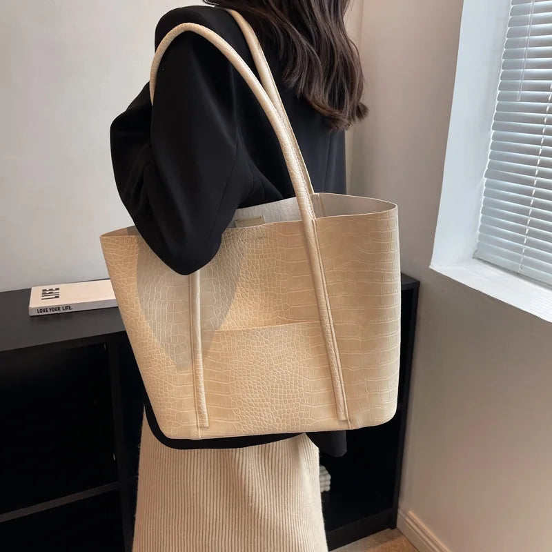 Borsa a tracolla in pelle di coccodrillo da donna