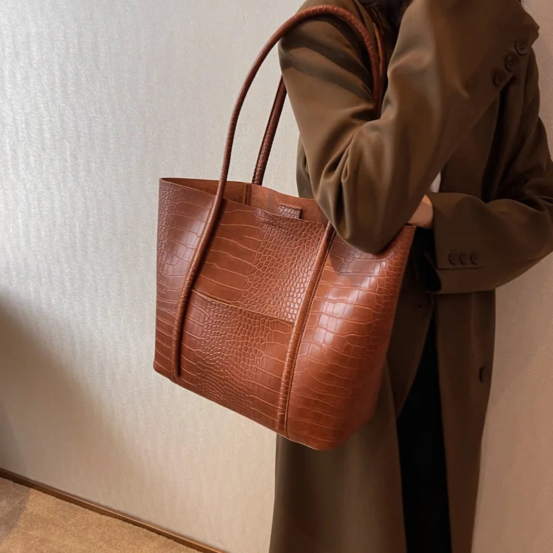 Borsa a tracolla in pelle di coccodrillo da donna