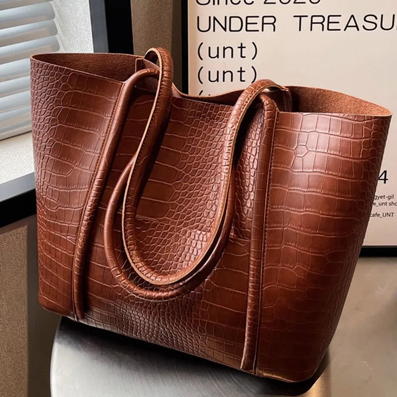 Borsa a tracolla in pelle di coccodrillo da donna