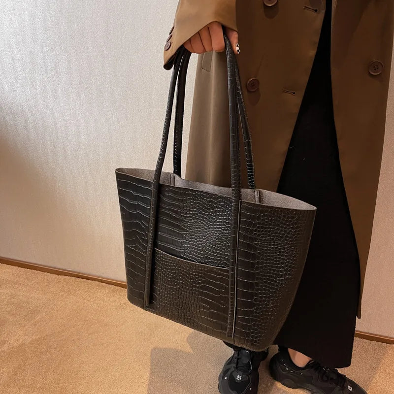 Borsa a tracolla in pelle di coccodrillo da donna